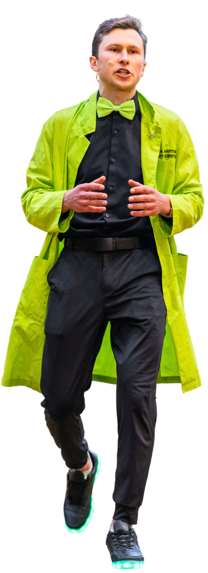 Jacques W. Martiquet on stage in his neon green lab coat